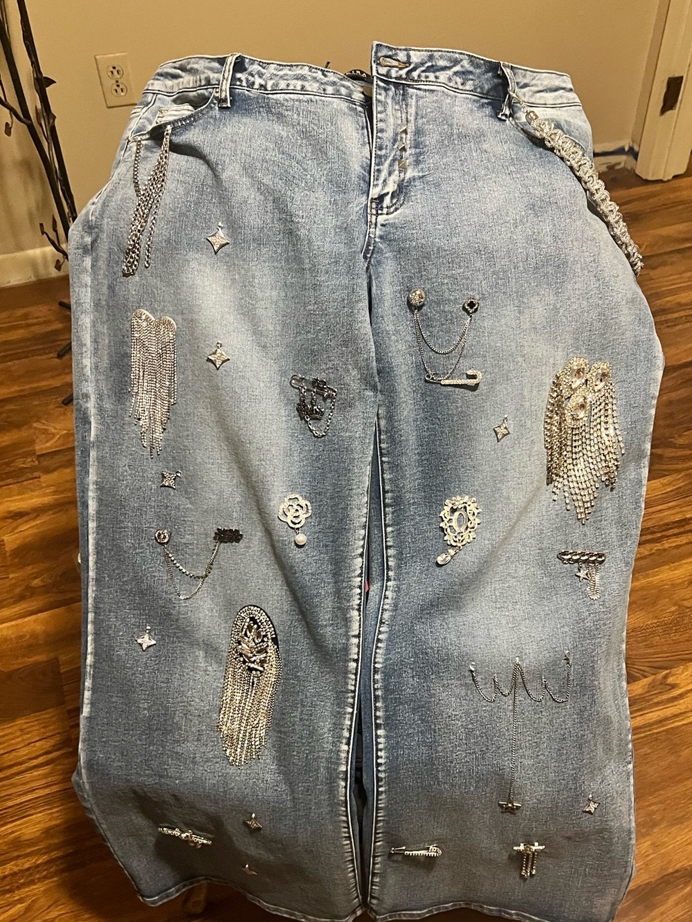 Shop AKIRA Embellished Light Wash Jeans with Rhinestone & Chain Accents